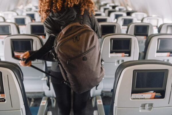 Can you bring a backpack on a plane for free?